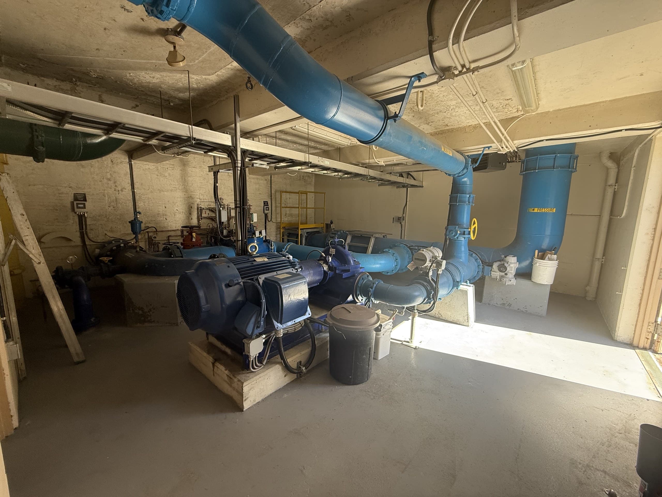 Pump station interior with large-diameter piping